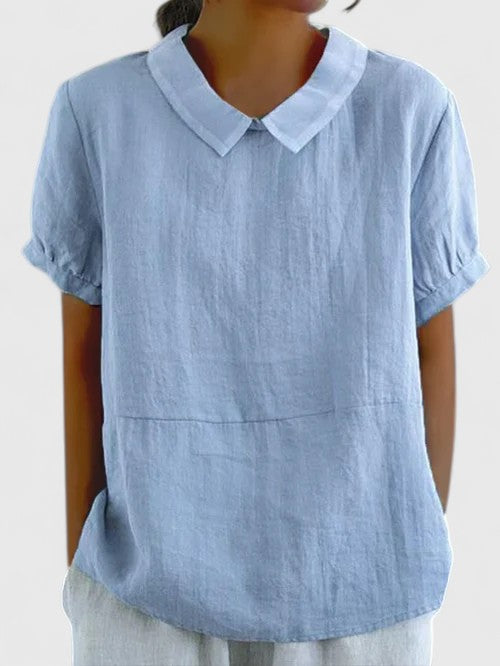 Versatile ladies' button-down shirt, an elegant long-sleeve top for timeless style and fashion.