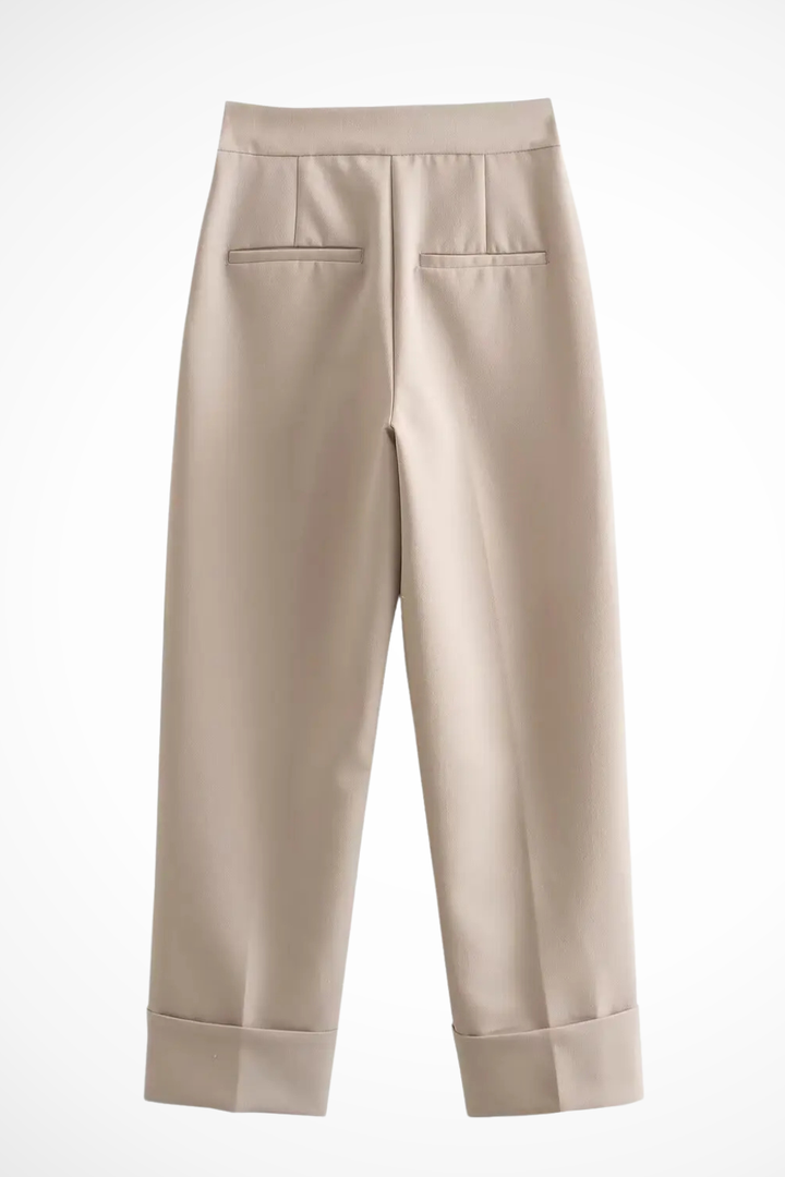 Fashionable beige women's tailored waistcoat and straight-leg trousers full suit, ideal for modern work outfits.