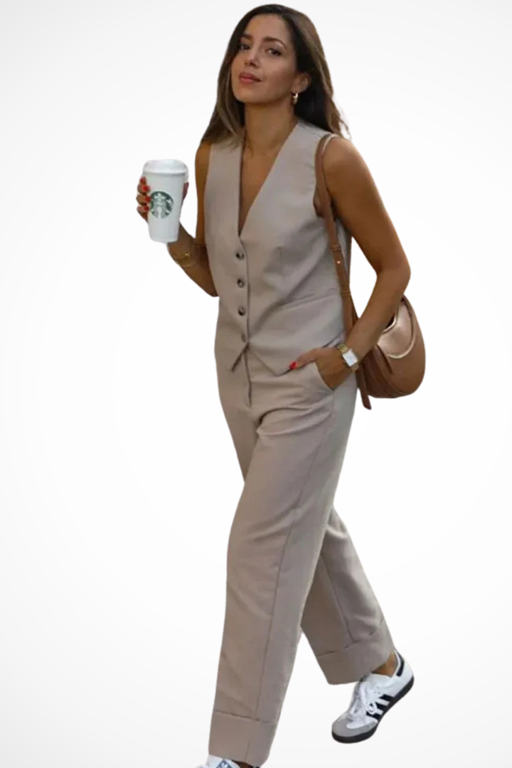 Complete women's beige tailored 2-piece suit, featuring a sleeveless waistcoat & elegant straight-leg trousers.