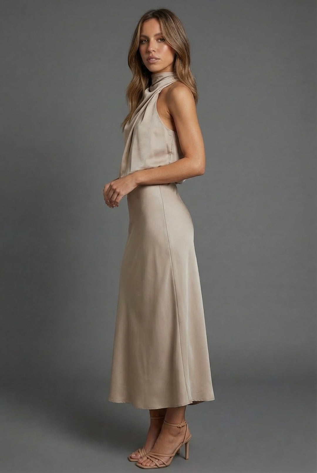 Elegant women's summer midi dress with halter neck, ideal for formal occasions.