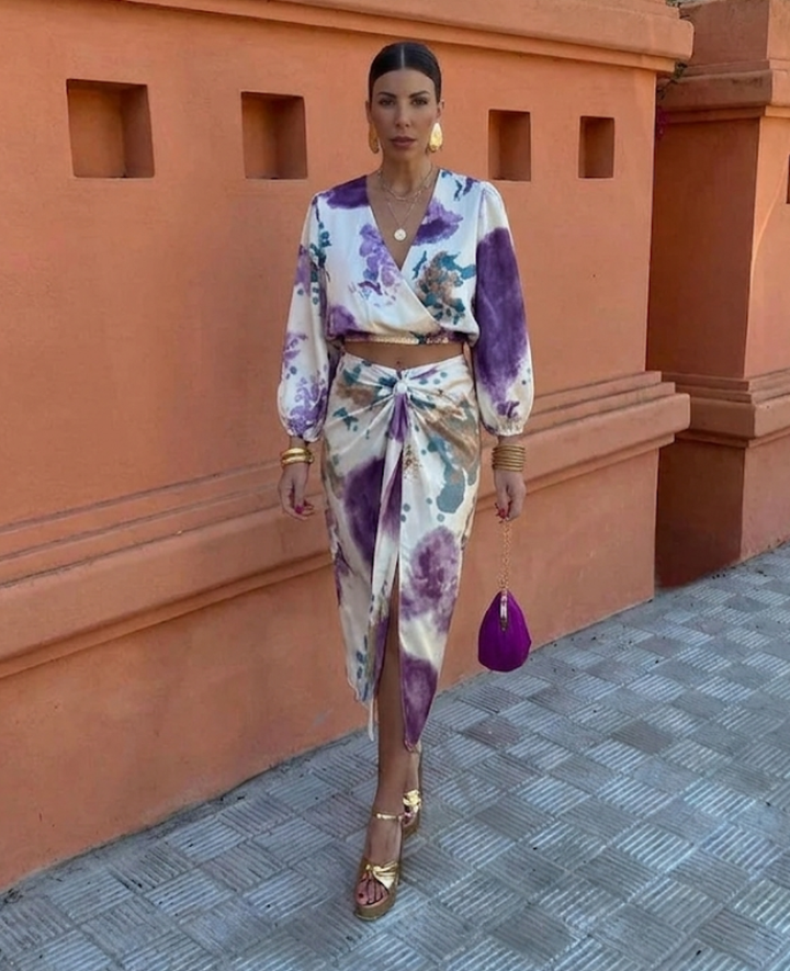 Elegant women's summer blouse & floral midi skirt set. Chic two-piece outfit for warm weather.