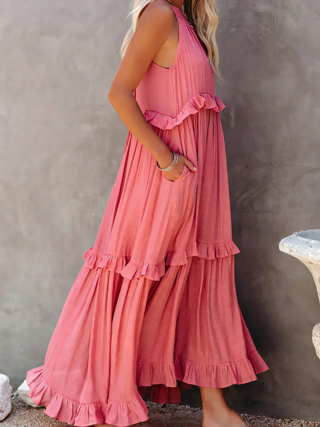 Vibrant red halterneck ruffle maxi dress with pockets, perfect for sunny holidays.