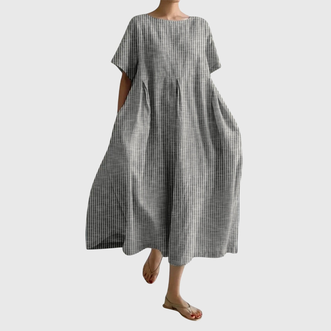 Sleeveless striped long maxi dress for women. Comfortable, breathable, and chic for relaxed everyday wear.