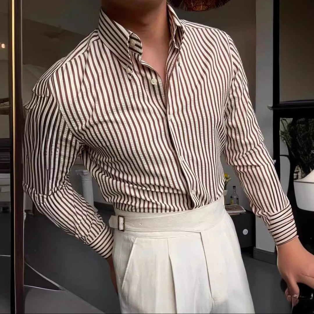 Classic men's striped long sleeve dress shirt. Button-down style, versatile for office attire or smart casual men's fashion.