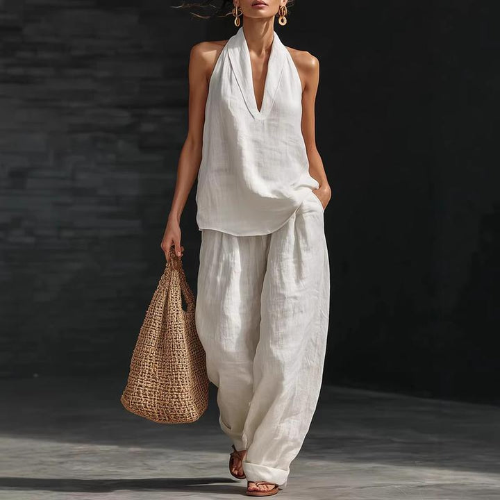 Women's linen-look two-piece set: batwing sleeve top & wide-leg pants. Effortless, comfortable summer fashion.