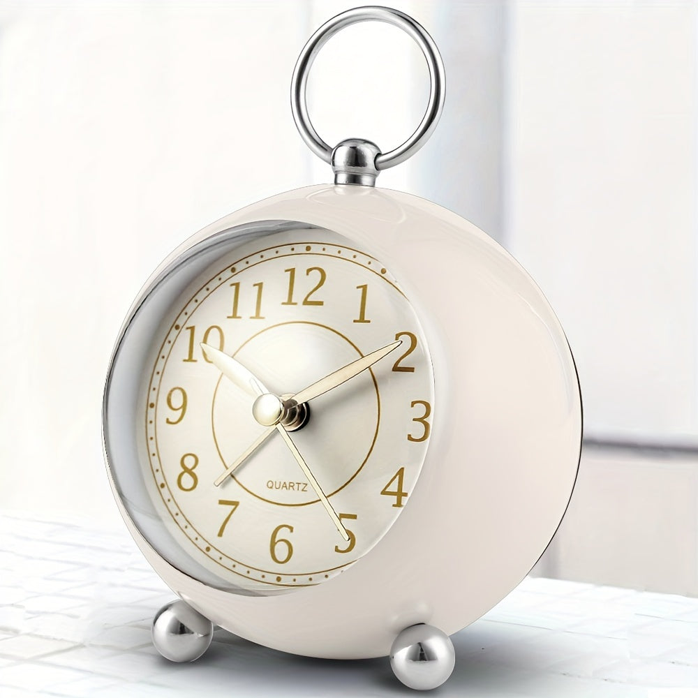 Light green vintage alarm clock, quiet operation & bright night light feature. Ideal for bedside table.