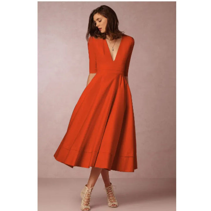 "Black A-Line V-Neck Short Sleeve Mini Dress for Spring/Summer, women's flattering silhouette, breezy and elegant style."