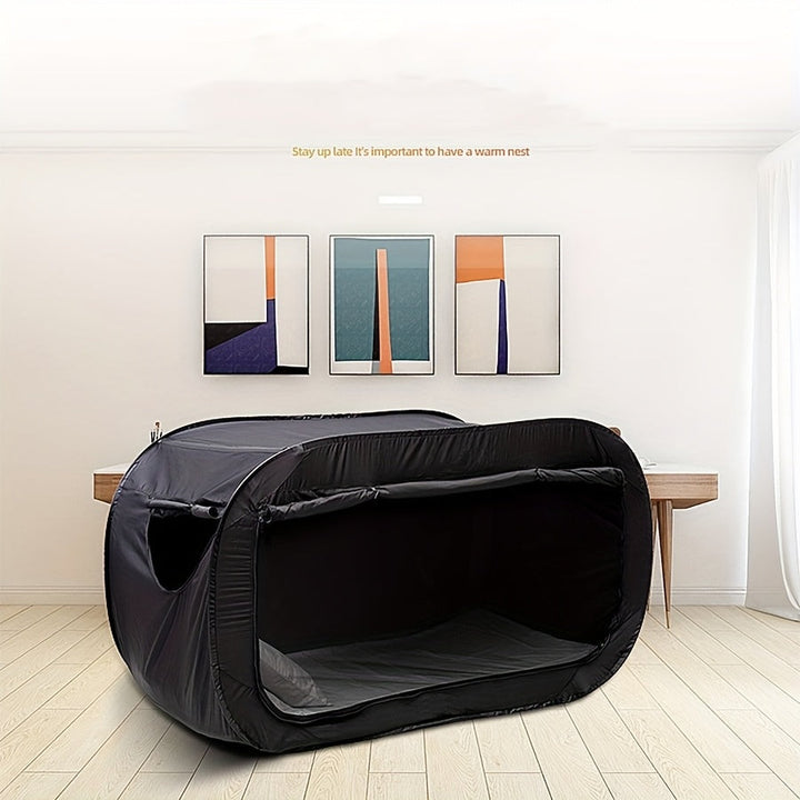 Foldable black tent bed provides private, comfortable sleep for camping, home, or student housing. Portable design.