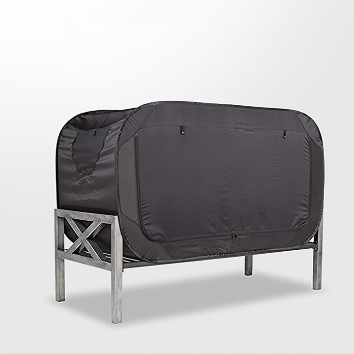 Compact black folding tent bed, ideal for private sleep during camping, travel, or as an indoor extra bed.