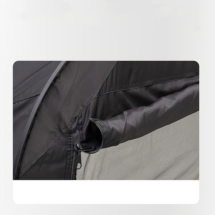 Black CozyNest portable tent bed for secure, private sleep in student housing, camping, or any indoor/outdoor space.