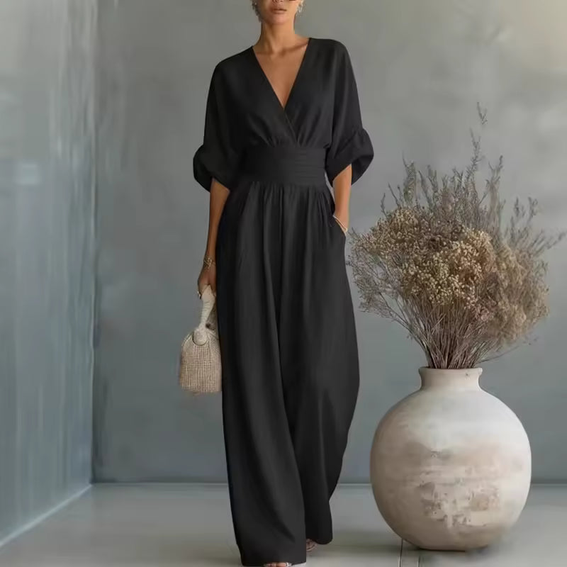 Stylish women's deep V-neck wide-leg jumpsuit, an elegant choice for any party or special occasion.