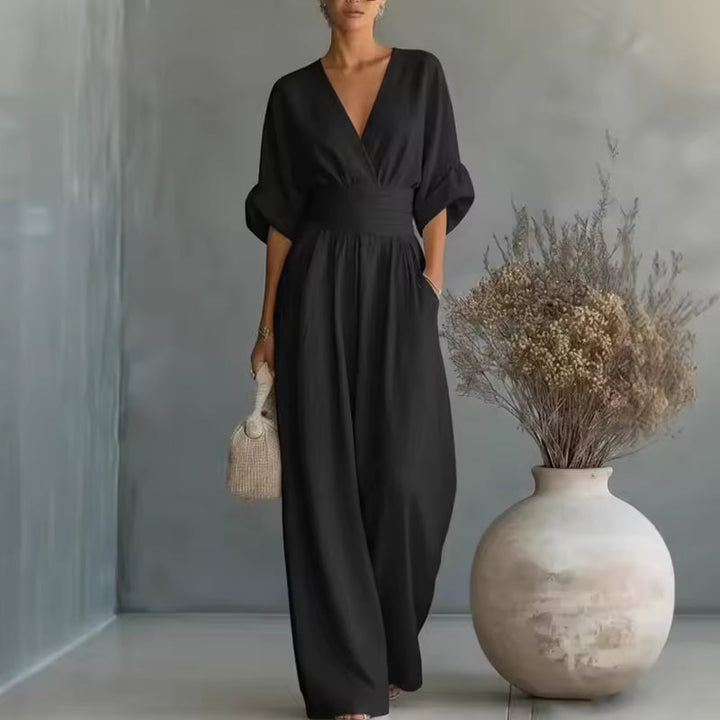 Stylish women's deep V-neck wide-leg jumpsuit, an elegant choice for any party or special occasion.