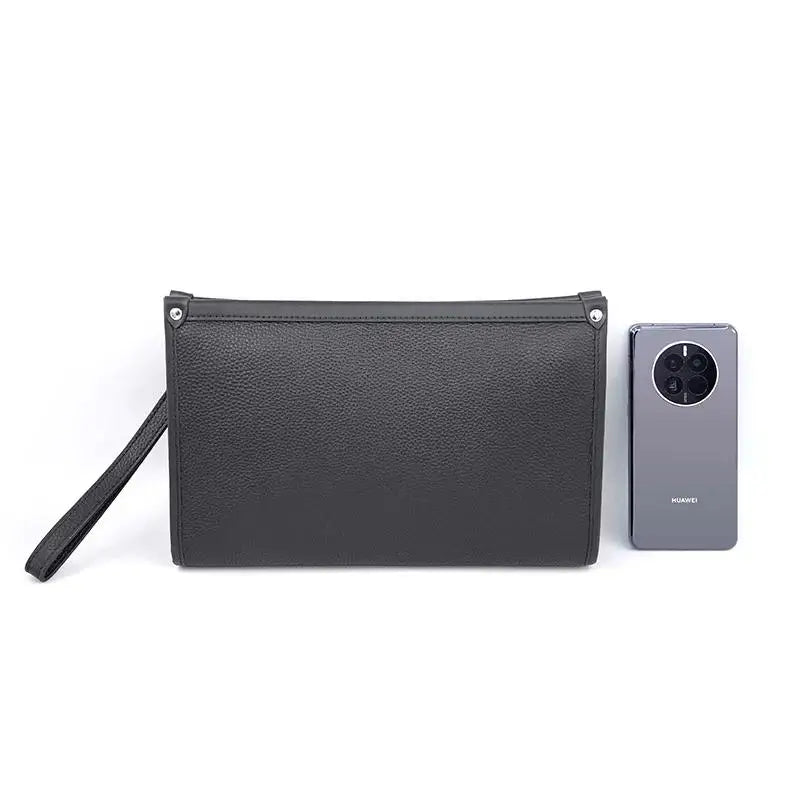Sleek black genuine leather men's business clutch, ideal for professional meetings & executive travel.