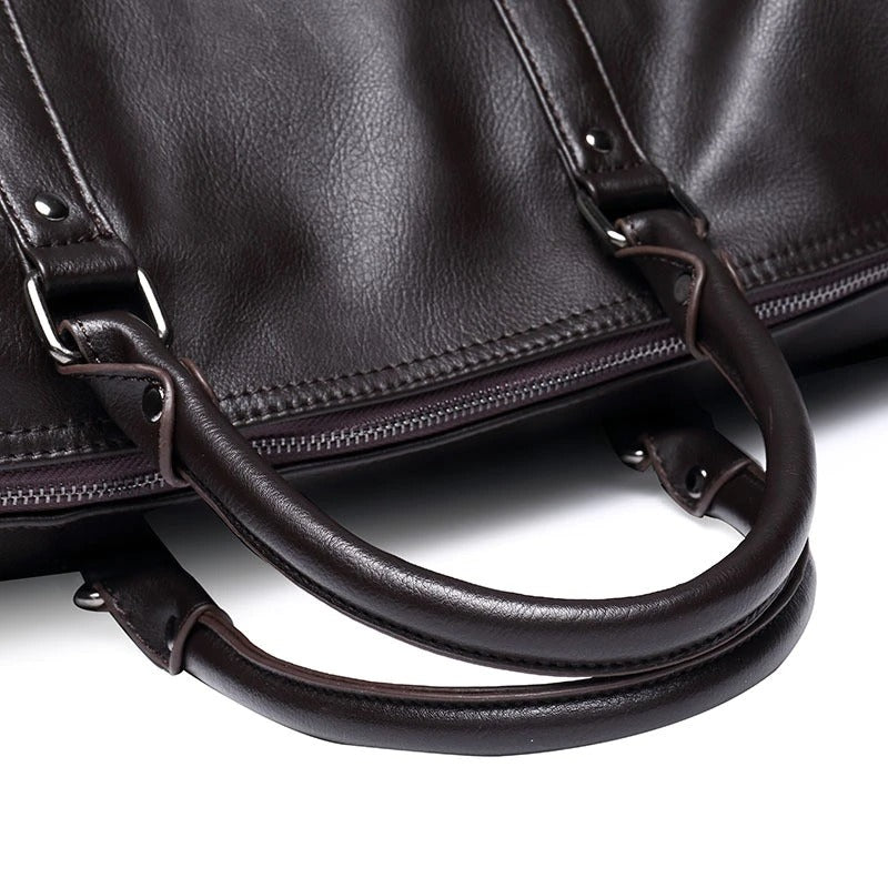 Stylish brown leather-look weekend bag. Unisex, durable for all your travel essentials.
