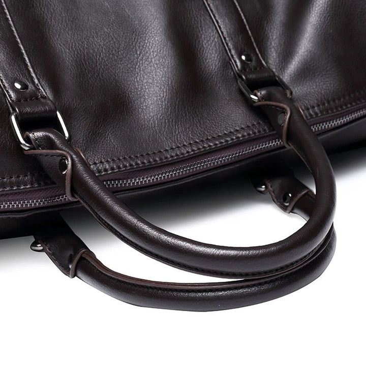 Stylish brown leather-look weekend bag. Unisex, durable for all your travel essentials.