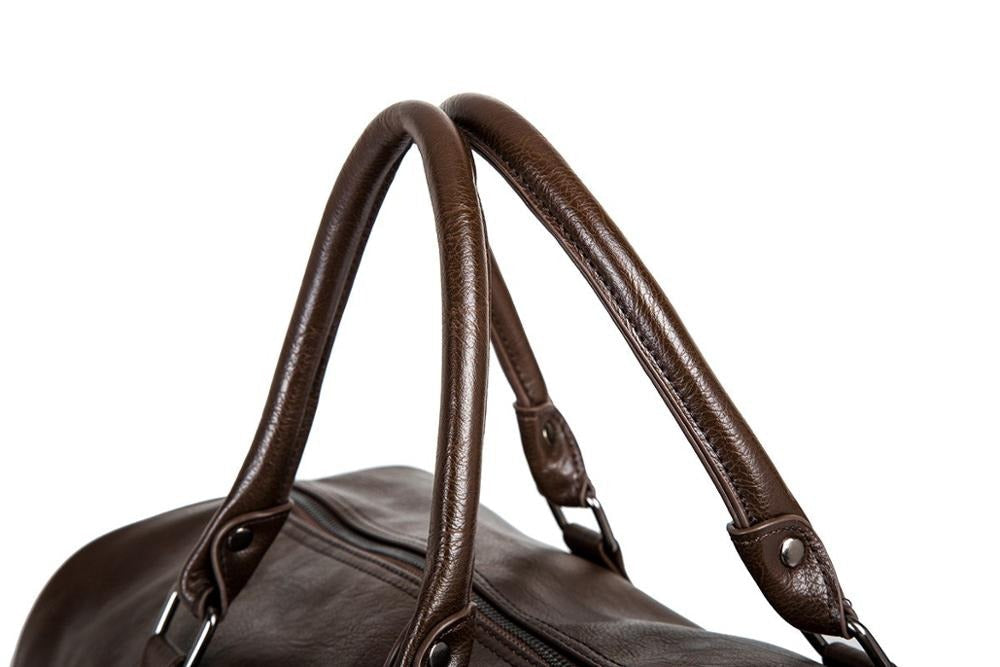 Brown leather-look carry-on duffel bag. Lightweight design for easy travel.
