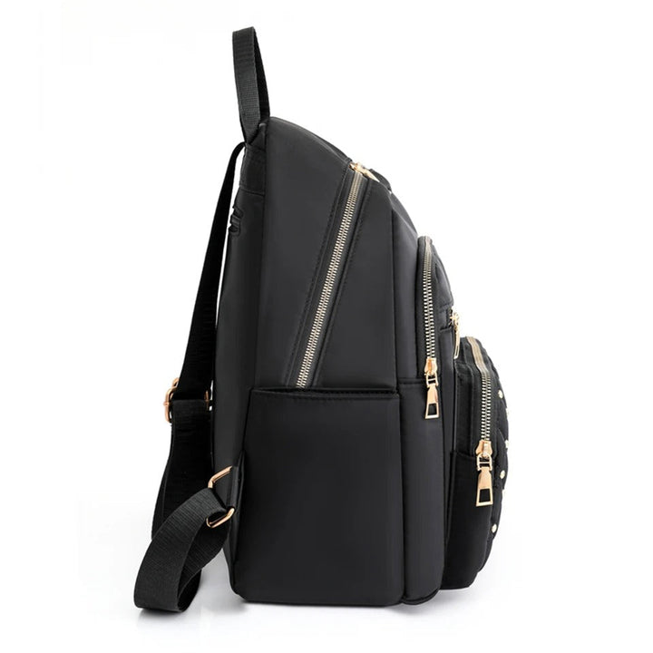 Chic black women's nylon backpack, lightweight and water-resistant for a practical & stylish daily commute.