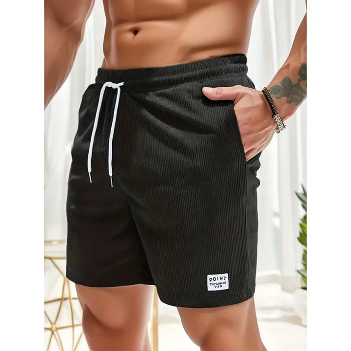 Comfortable men's summer shorts with drawstring waist, ideal for casual everyday wear and warm weather.