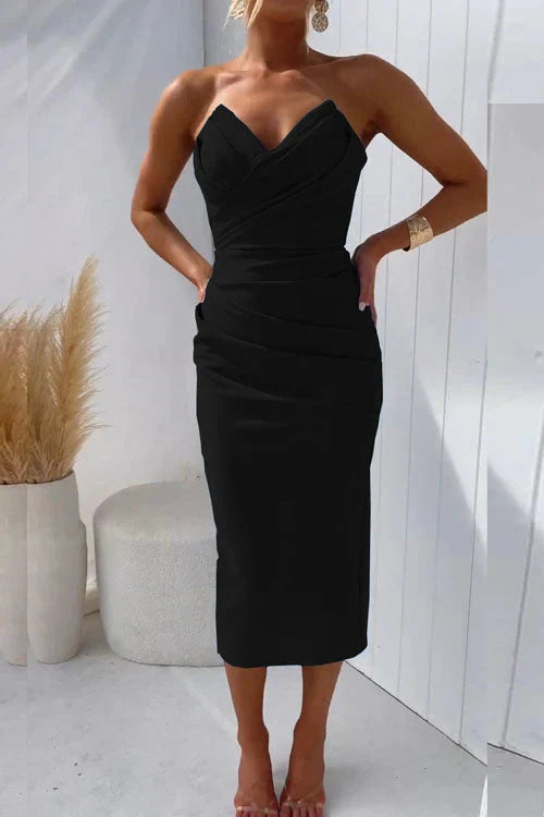 Elegant women's special occasion midi dress, featuring a chic sleeveless design & flattering silhouette.