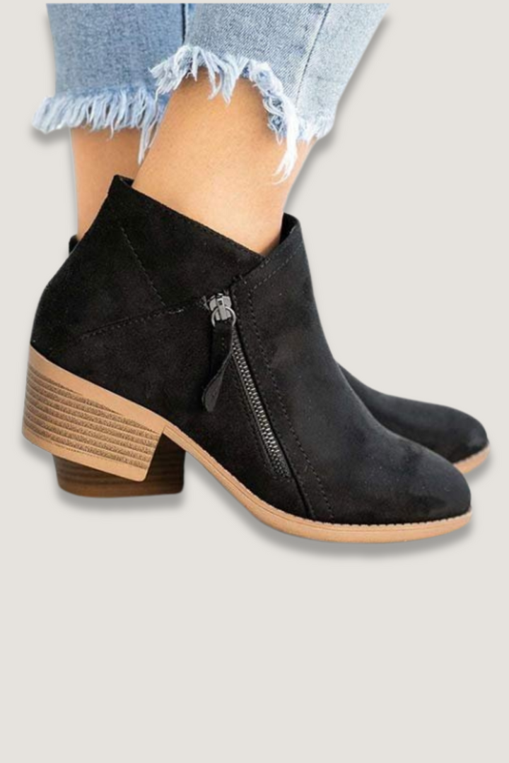 Stylish women's black ankle boots, perfect for comfortable everyday wear and fall fashion.
