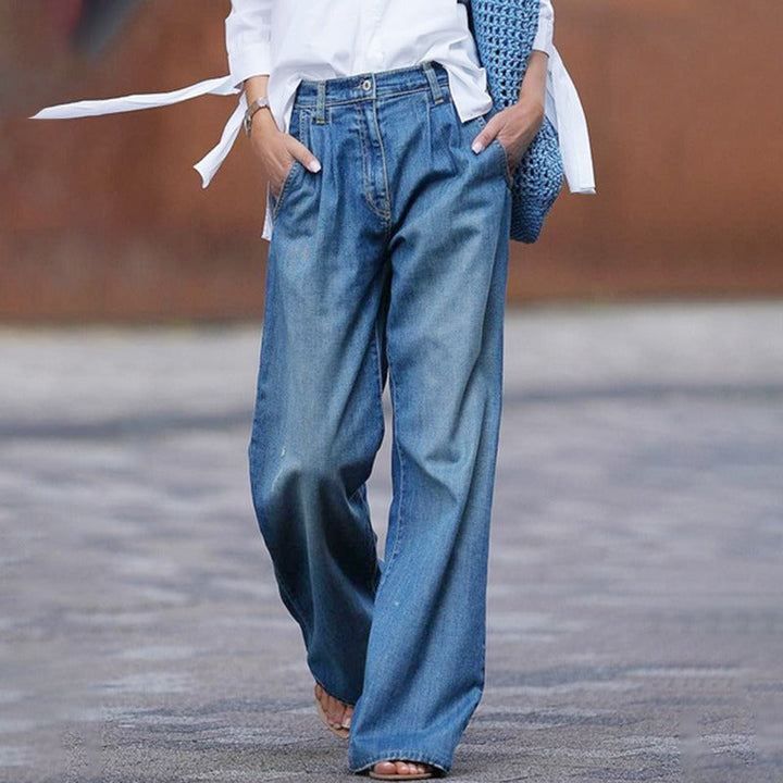 Women's vintage blue wide leg jeans, high waist retro style, perfect for casual summer fashion.
