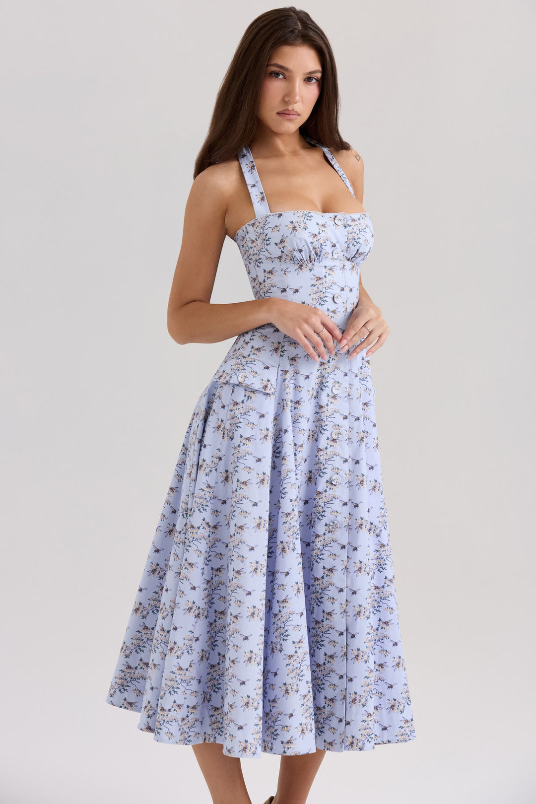 Casual or occasion women's daisy print halter neck midi dress. Flattering A-line, comfortable summer wear.