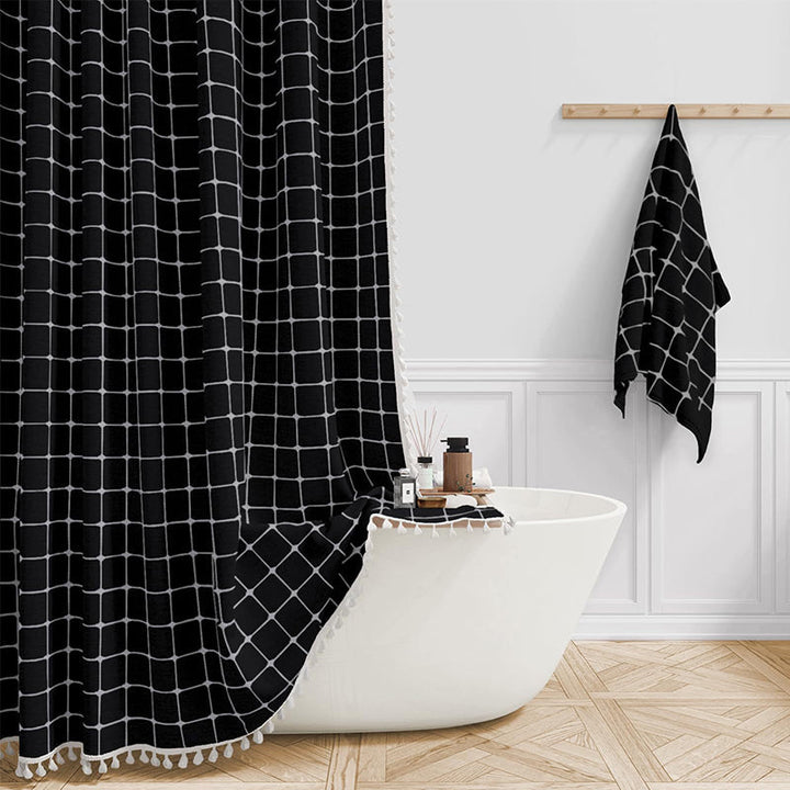 "Bohemian farmhouse waterproof linen shower curtain with decorative tassels, shown in a warm beige plaid pattern."