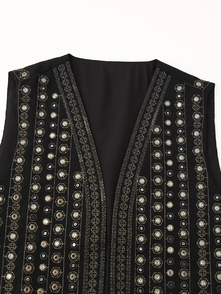 Intricate sequin embroidered women's sleeveless waistcoat. Dazzling boho vest, great as a festival or party layering piece.