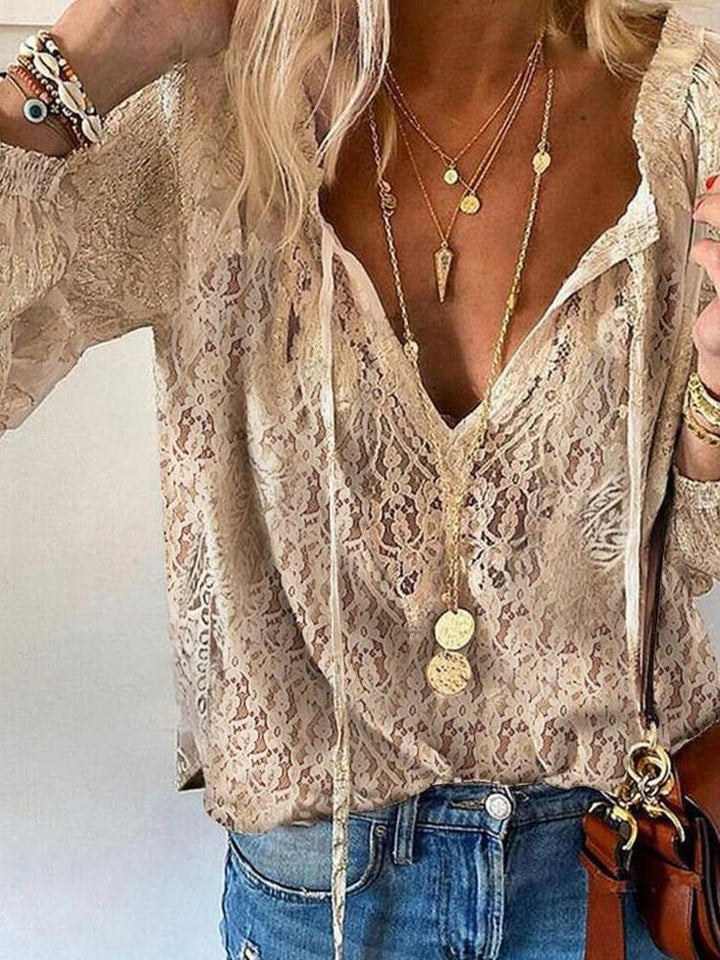 Women's elegant boho blouse with stylish cutout neckline, perfect for chic spring & summer fashion.