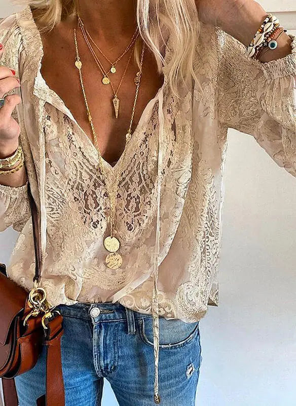 Stunning women's elegant boho blouse with a flattering cutout neckline, a must-have for modern bohemian fashion.