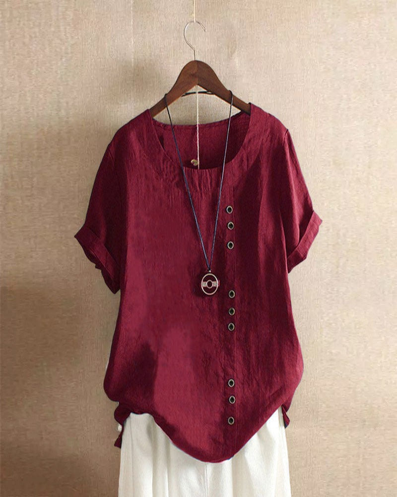 Ladies' short sleeve round neck blouse; an effortless, comfortable, and modern spring/summer top.