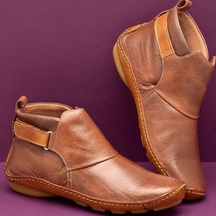 Stylish women's orthopaedic ankle boots. Ergonomic design provides comfort, support, & flexibility for daily wear.