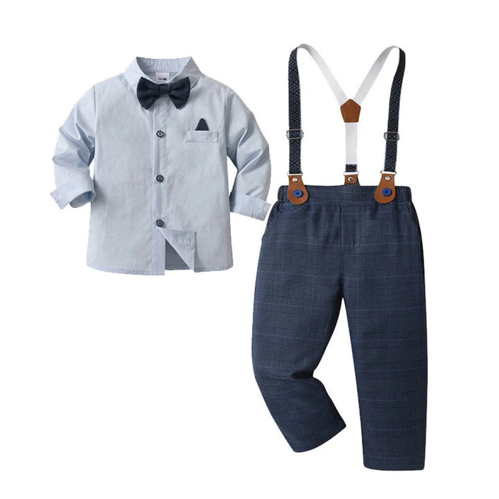Close-up of boys' formal waistcoat with bow tie. Chic kids' vest set for special events.