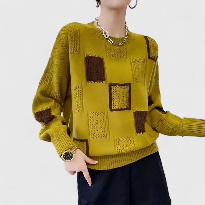 Cozy women's openwork sweater in a chic, versatile knit. Perfect round neck, long sleeve for elegant autumn wear.