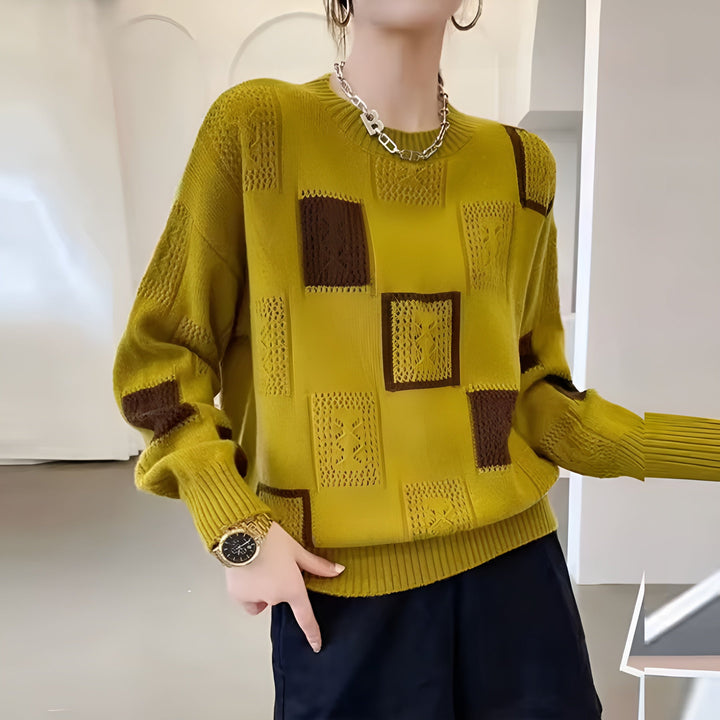 Stylish women's knit pullover sweater, offering cozy comfort. Chic long sleeve round neck top for elegant winter fashion.