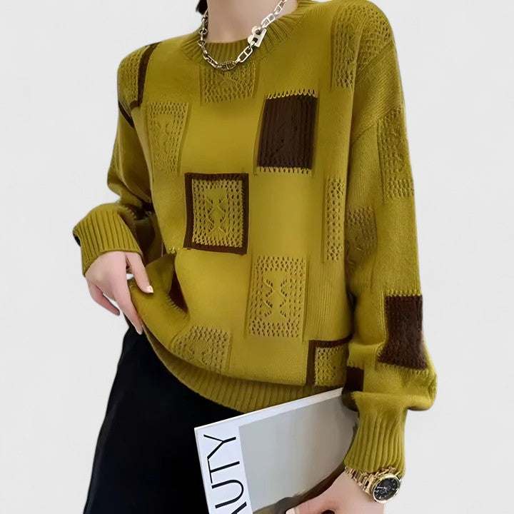 Women's elegant long sleeve openwork sweater with a round neck. Cozy knitwear, ideal for chic autumn & winter fashion.