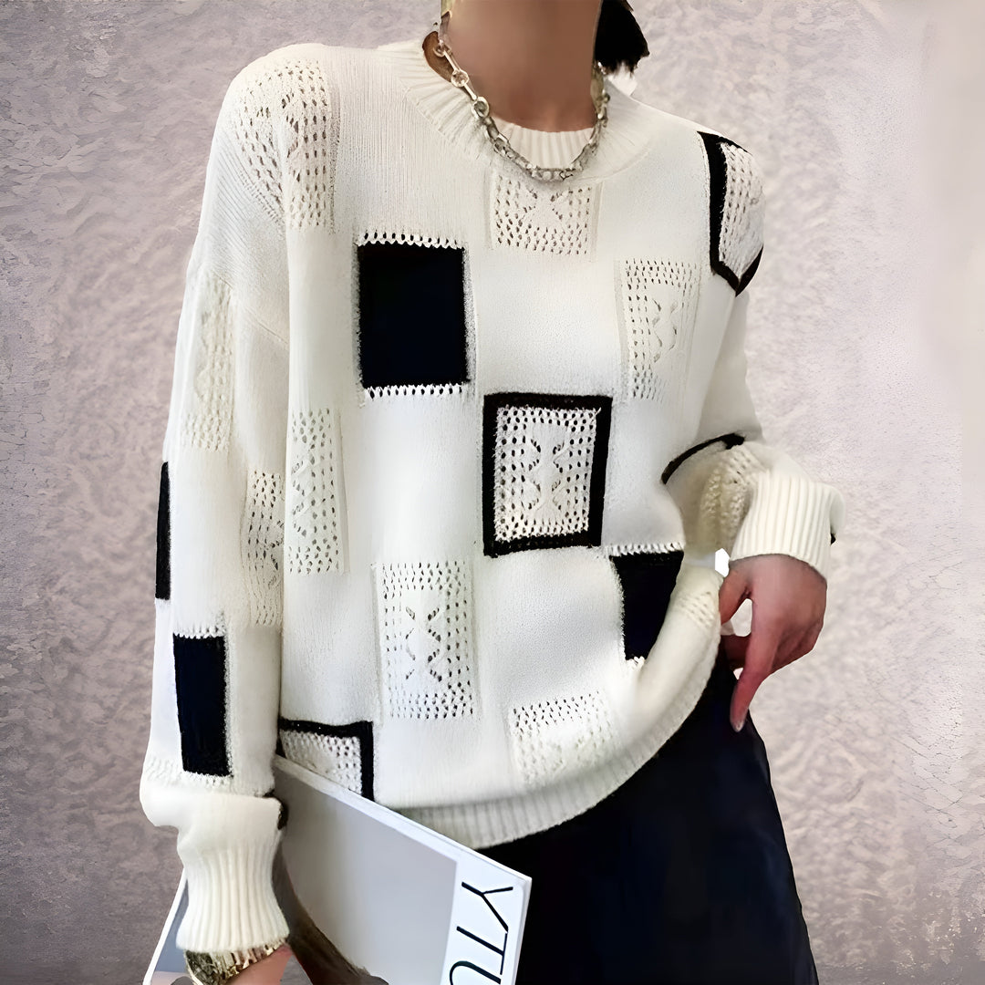 Soft knit women's pullover sweater, perfect for casual chic elegance. Cozy long sleeve winter top with round neck.
