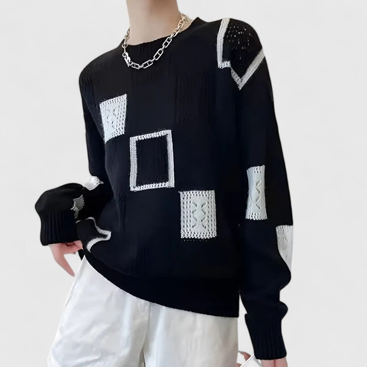 Woman modeling a chic, elegant openwork knit sweater. Cozy round neck, long sleeve for versatile autumn/winter fashion.