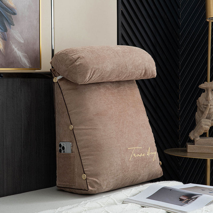 Plush ergonomic pillow with armrests, designed for comfortable reading and ultimate back support.