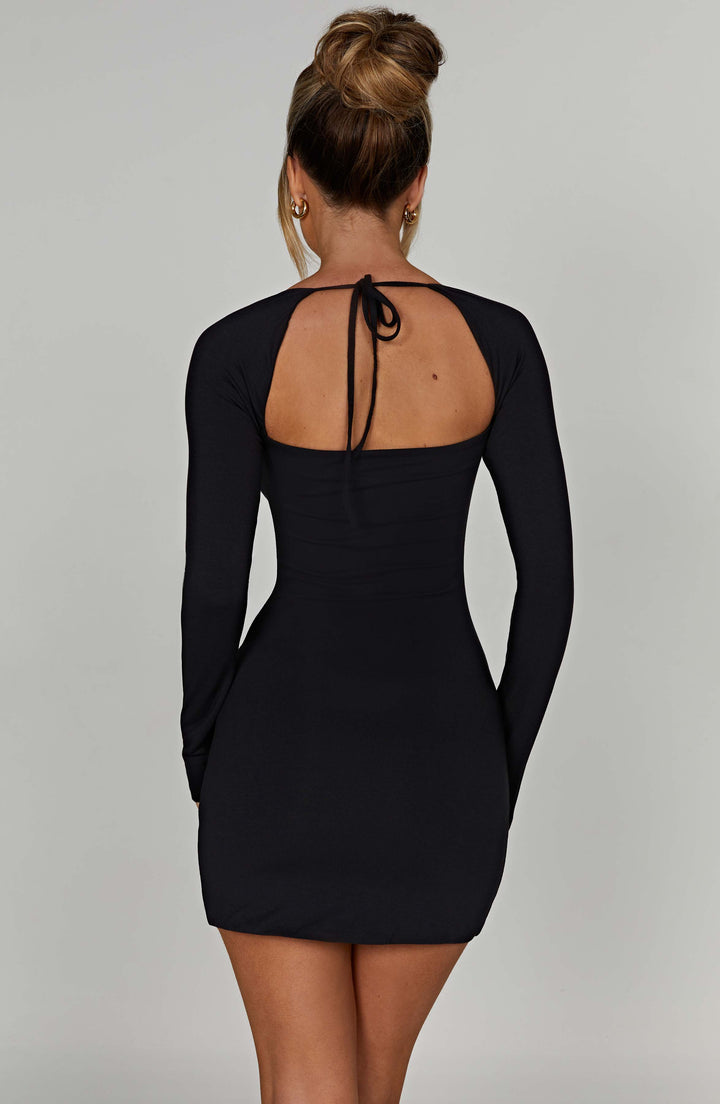 Chic women's black fitted mini dress featuring a modern square neckline, ideal for elegant parties & evening events.