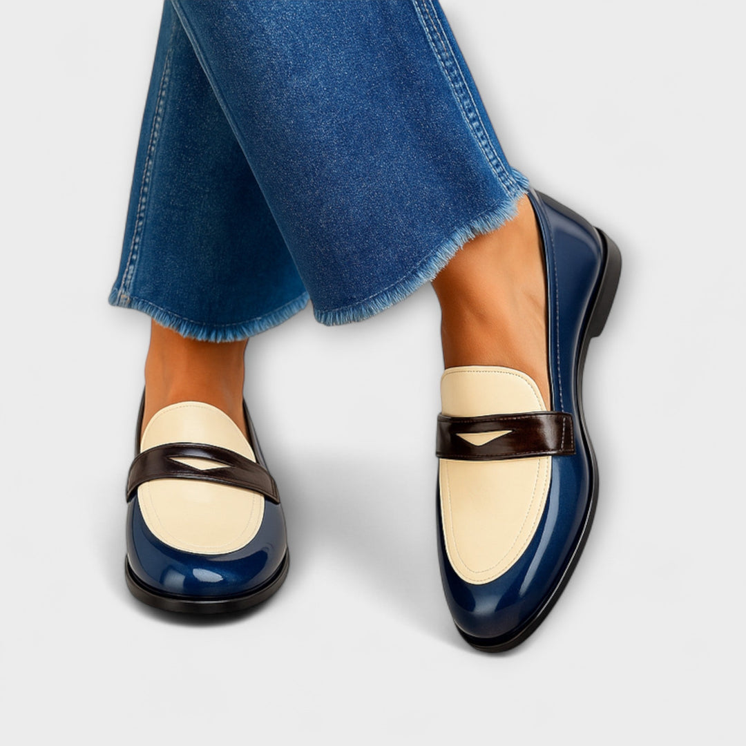 Women's two-tone slip-on loafers, comfortable and elegant for everyday casual wear. Fashionable flats.
