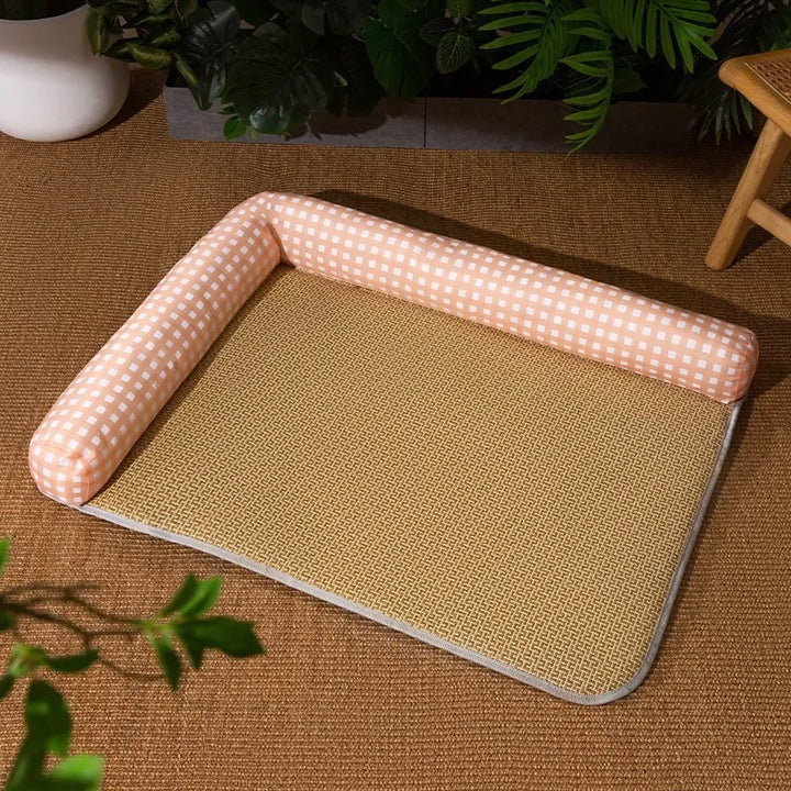Cooling pet mat for hot summer days, designed with a raised edge for head support. Easy-clean cat bed.