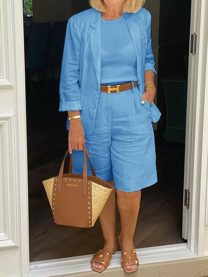 Stylish women's two-piece summer set with a light jacket & matching shorts, great for casual warm weather fashion.