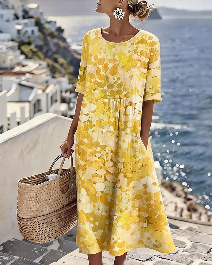 Women's A-line floral print midi dress, short sleeve, round neck, offering casual chic elegance.
