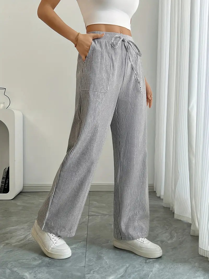 Women's fashion wide leg pants, elegant stripes, perfect for spring events.