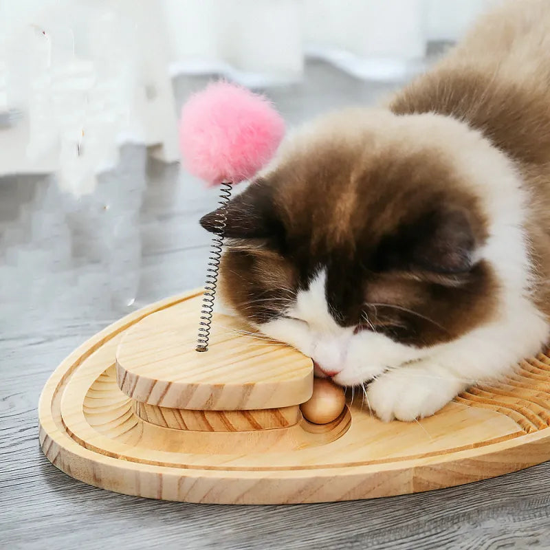 Stylish wooden cat accessory: a scratching board with built-in feather & ball toys for interactive pet play.