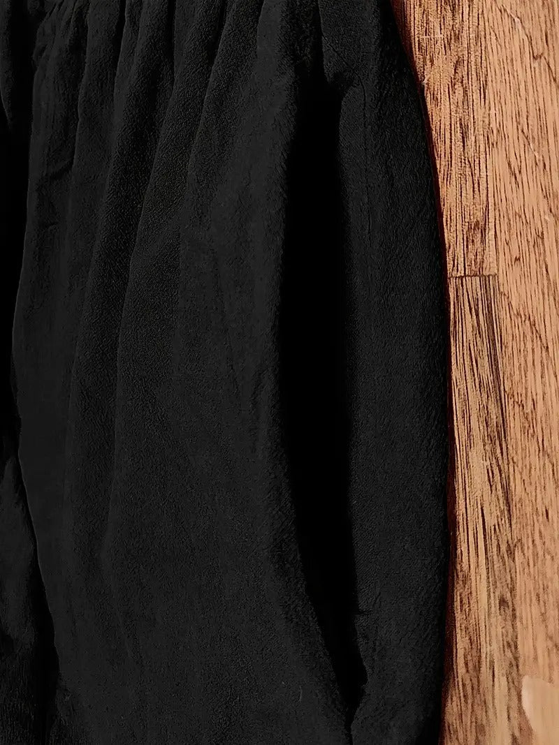Casual women's short sleeve maxi dress with a round neck and handy pockets. Great for versatile everyday wear.