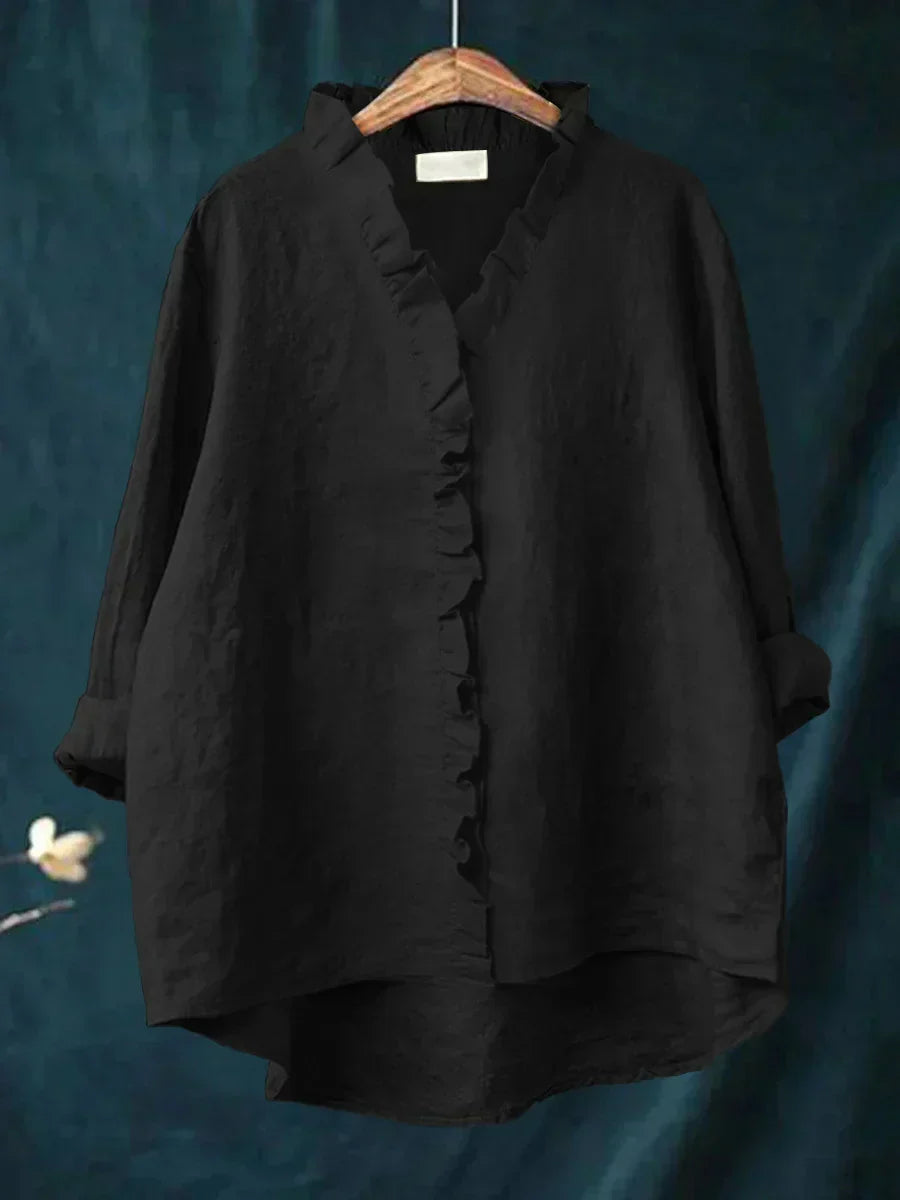 Soft women's casual ruffle V-neck blouse. Long sleeve top for comfortable everyday fashion.
