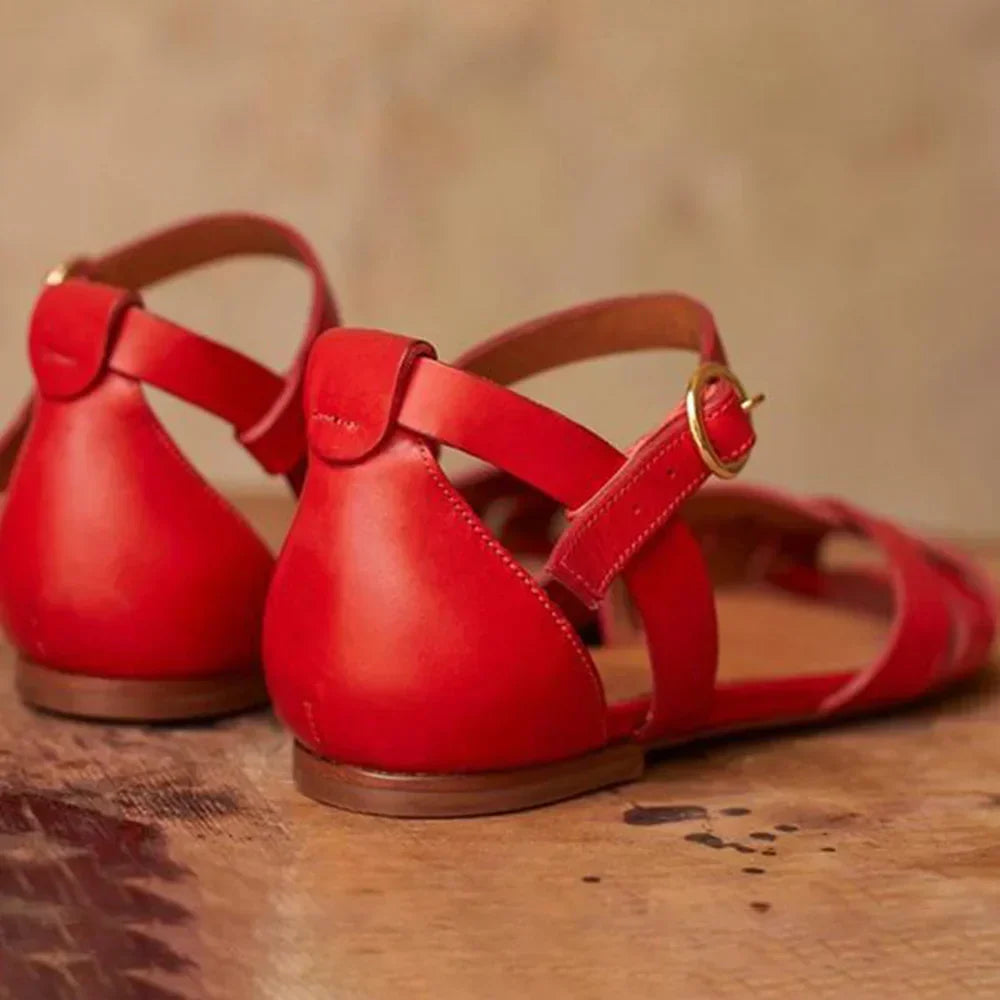 Soft, comfortable women's low strap flat sandals. Stylish design perfect for summer casual wear.