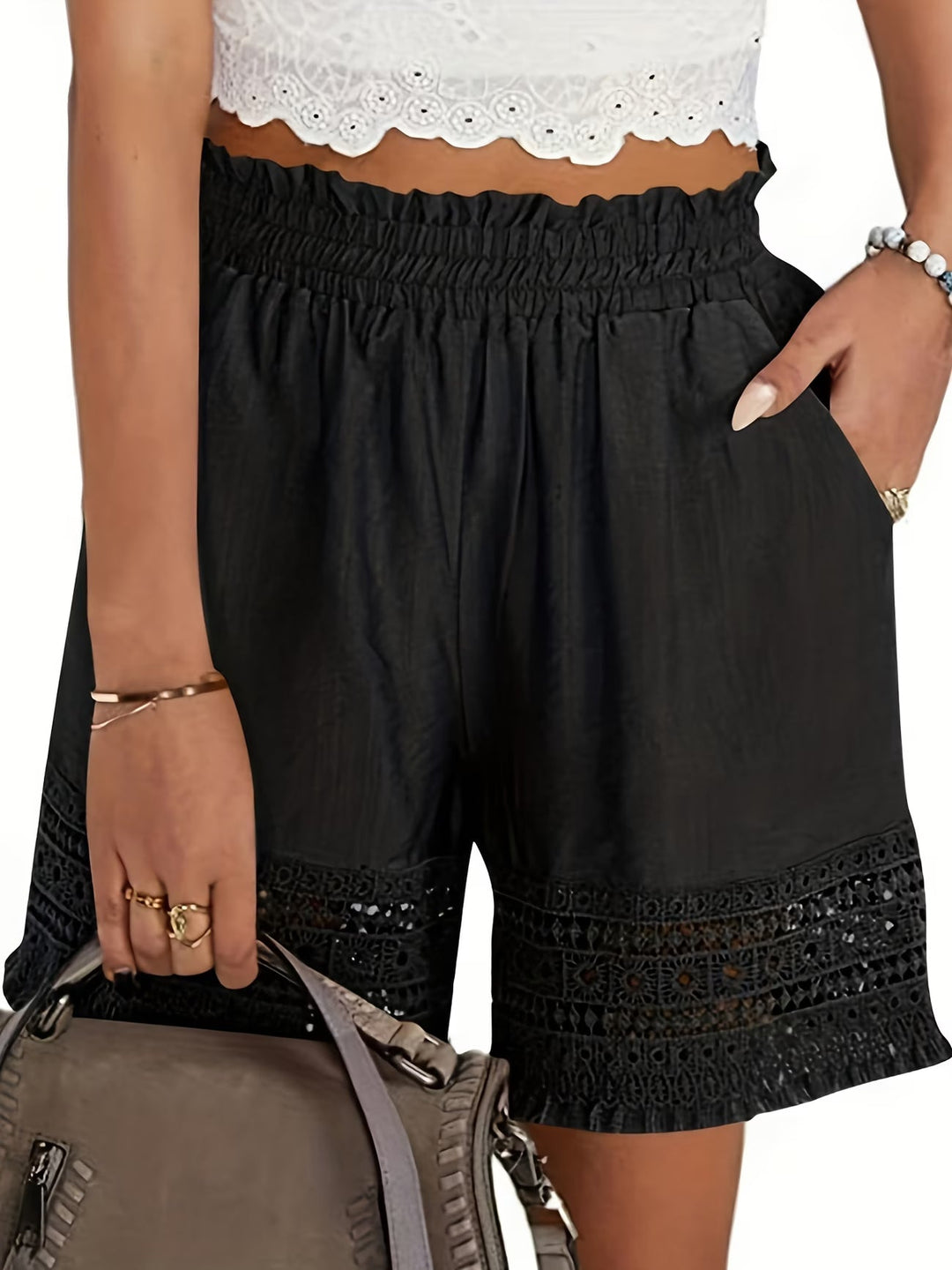 Chic women's tailored shorts with delicate lace trim & slant pockets, ideal for versatile summer fashion.